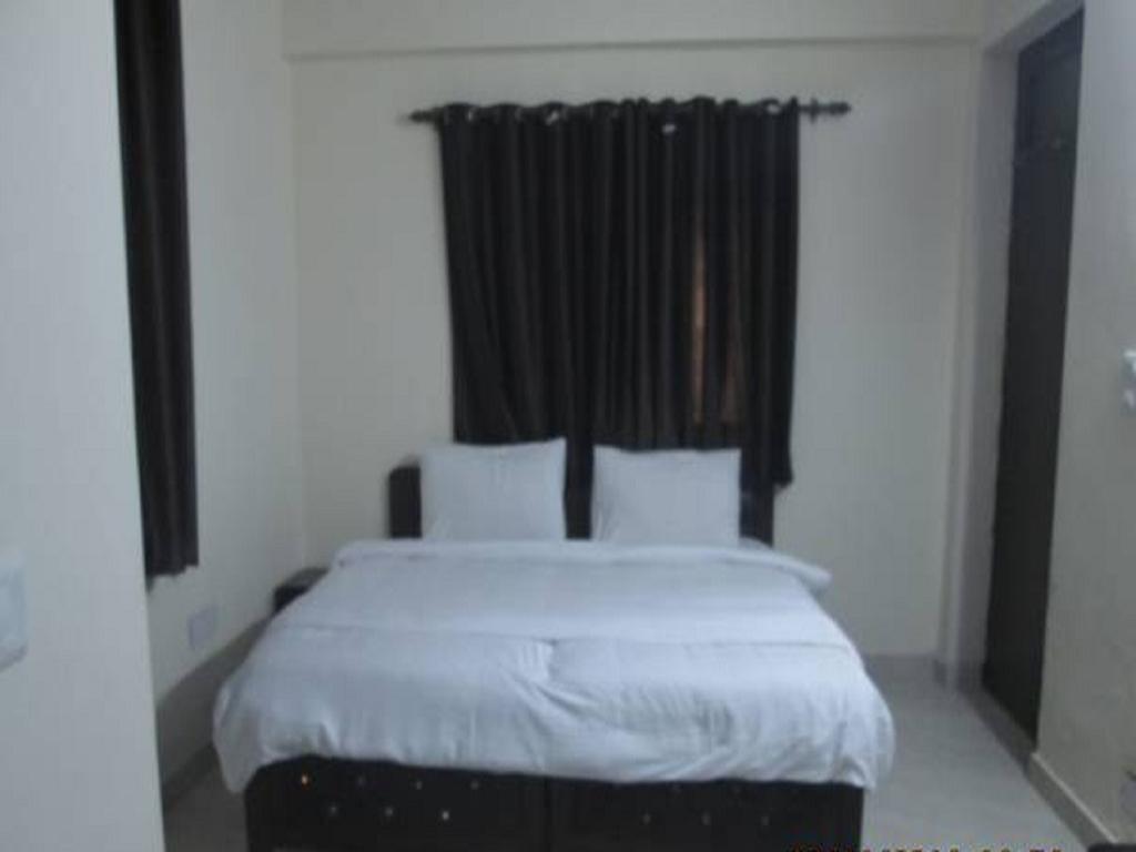 Charanpahari Hotel Nueva Delhi Habitación foto